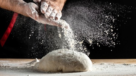 What You Should Know Before Making Bobby Flay's Pizza Dough