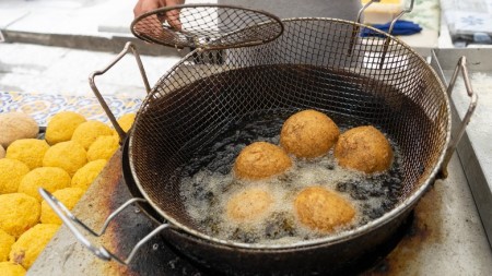 Bobby Flay's Top Tip For Turning Risotto Into Arancini